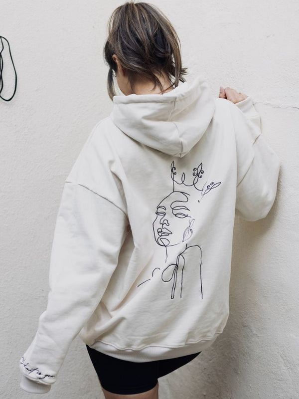 nikita cream white ecru sand hoodie oversized with line drawing queen logo empowering quote quality jumper airport outfit drawstring hoody