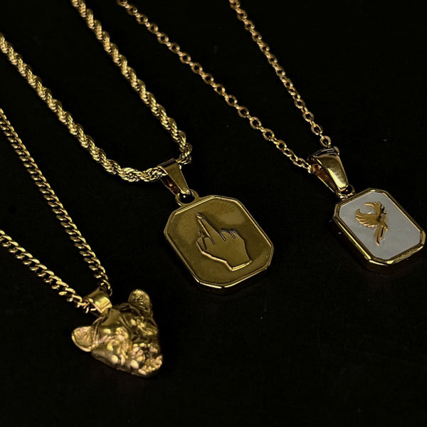NIKITA 'I am Savage' middle finger pendant necklace with quality 18k gold plating and a bold twist adjustable twist chain. A fun gift for best friend.