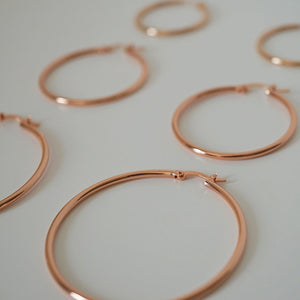 NIKITA classic, every day hoop earrings. Waterproof and hypoallergenic 18k plated hoops with a stainless steel base. Everyday jewellery gift for her.