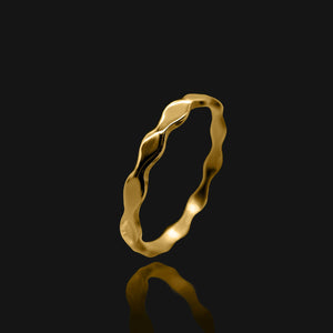 NIKITA river minimal ring with ripple design, to wear on your thumb or finger. Waterproof 18k gold plating and a hypoallergenic stainless steel base. Christmas everyday jewellery gift for her.