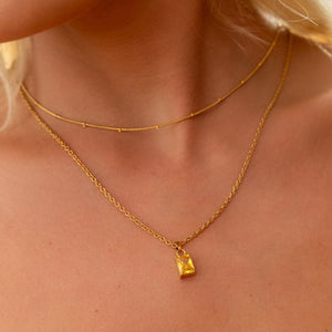 NIKITA citrine pendant necklace with a unique precious stone design and 18k plated gold finish. A water-resistant pendant and adjustable chain made with a hypoallergenic stainless steel base. Christmas everyday jewellery gift for her.