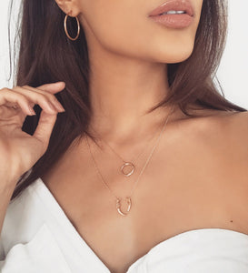 NIKITA classic, every day hoop earrings. Waterproof and hypoallergenic 18k plated hoops with a stainless steel base. Everyday jewellery gift for her.