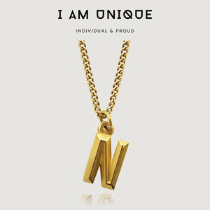 NIKITA custom initial pendant necklace with a unique, personalised letter design. A water-resistant 18k gold plated pendant and adjustable chain made with a hypoallergenic stainless steel base. Christmas everyday jewellery gift for her.