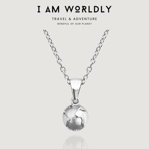 NIKITA globe pendant necklace with a unique, 3D earth design. A water-resistant world pendant with quality 18k gold plating and adjustable chain made with a hypoallergenic stainless steel base. Christmas everyday jewellery gift for her.