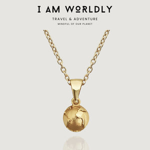 NIKITA globe pendant necklace with a unique, 3D earth design. A water-resistant world pendant with quality 18k gold plating and adjustable chain made with a hypoallergenic stainless steel base. Christmas everyday jewellery gift for her.