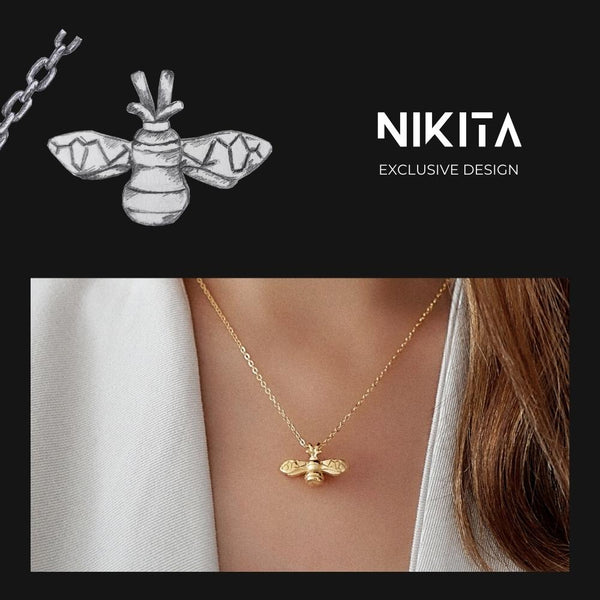 NIKITA bumble bee pendant necklace with a unique, intricate design and an 18k plated gold finish. A water-resistant pendant and adjustable chain made with a hypoallergenic stainless steel base. Christmas everyday jewellery gift for her.