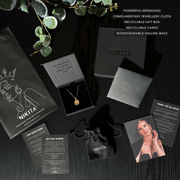 NIKITA luxury black branded, recyclable and biodegradable gift packaging.