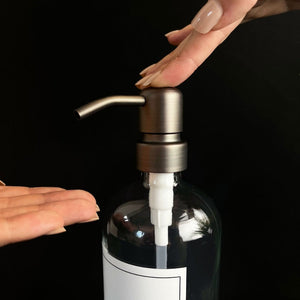 NIKITA clear glass dispenser bottle set with stainless steel pumps for your bathroom. Durable soap dispensers with waterproof labels for shampoo, conditioner and body wash. Ideal new home gift for her or gift for couple.